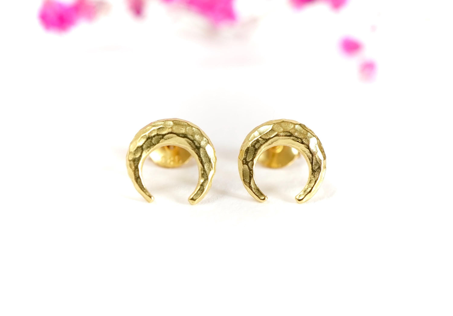 Gold stud earrings